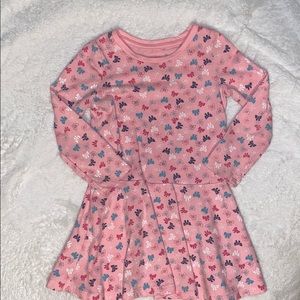 Pink cotton dress with bows.